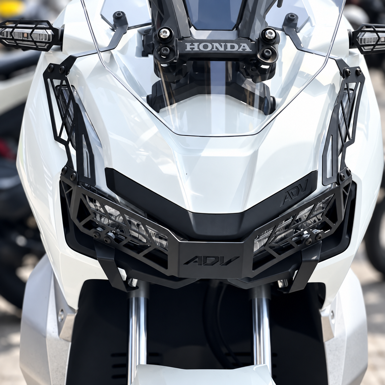 محافظ چراغ جلو فلزی HONDA ADV150 ADV160 کد 201117